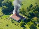 Photos aériennes de "incendie" - Photo réf. E150702 - Incendie d'une maison en août 2013.