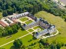 Photos aériennes de "Chateau" - Photo réf. E151323 - Le Chteau de Clermont, ancienne demeure de l'acteur Louis de Funs. Depuis 2014 le Muse de Louis se visite dans l'ancienne orangerie du chteau.