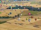 Photos aériennes de "montgolfières" - Photo réf. E157799 - Lorraine Mondial Air Ballons 2015 : Vol du Dimanche 26 Juillet le matin lors du Record Mondial de Dcollage en Ligne. (The Great Line, In-line Mass Ascent)